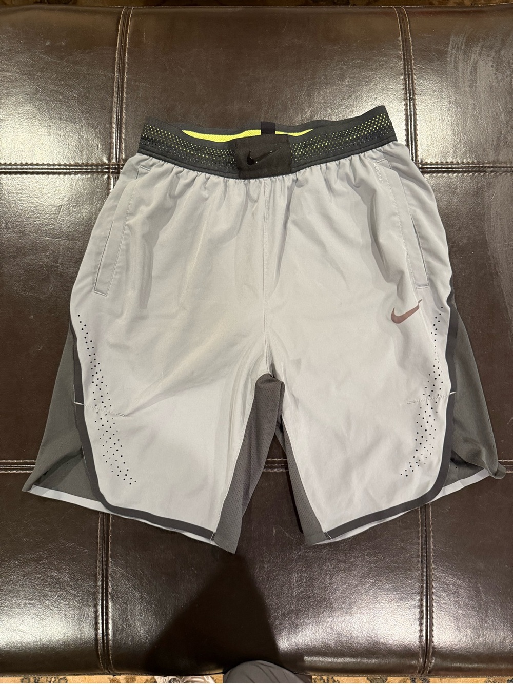 Nike Men’s Light Gray Athletic Shorts with Black Waistband and Lime Detail